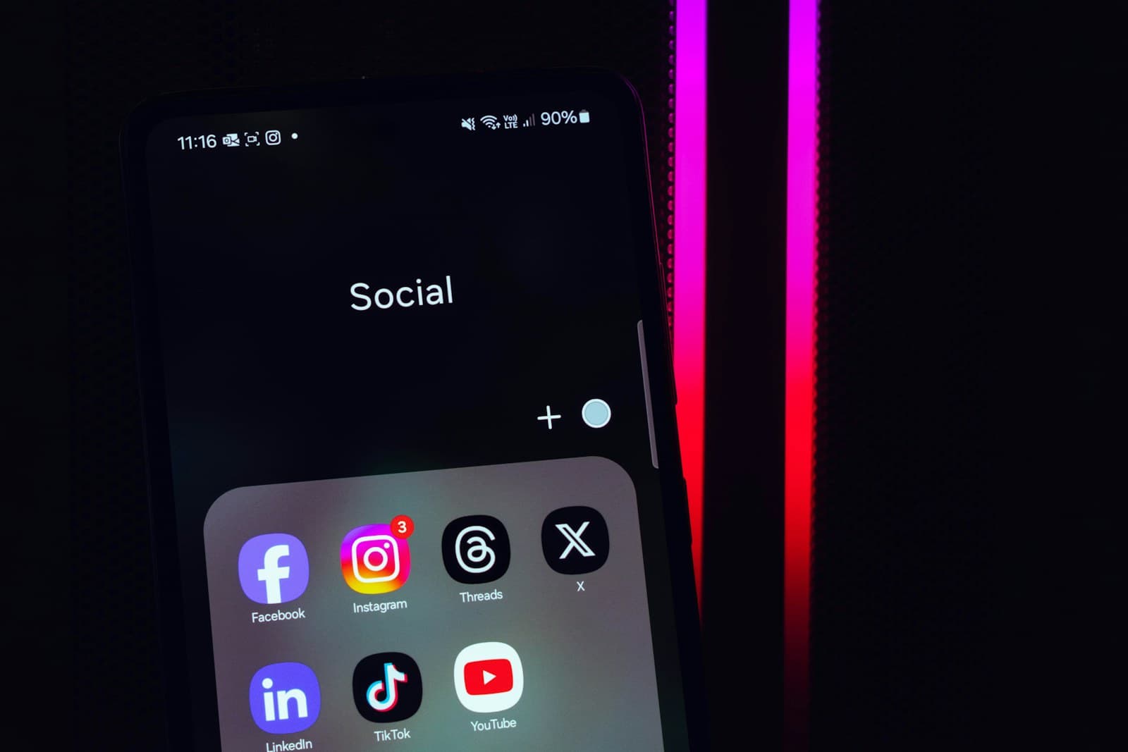 Instagram, Threads, and social account apps grouped on a mobile device