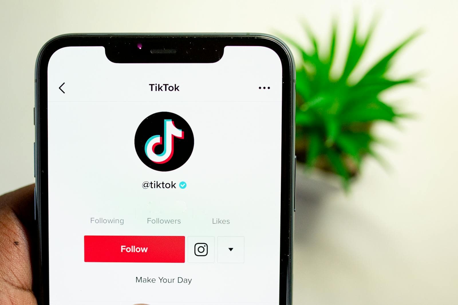 TikTok account app icon on a mobile device